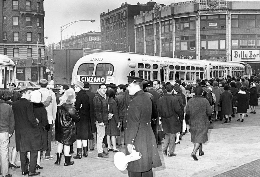 a-massive-line-of-commuters-by-bus-1966-barney-stein (2).jpg